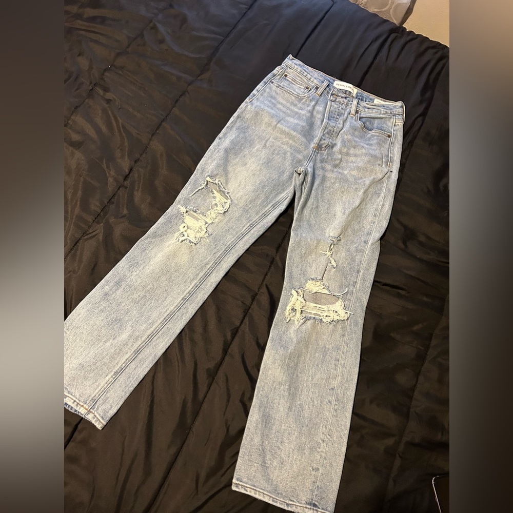 Jeans were never worn they did not fit.
